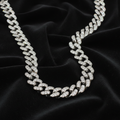 Stainless steel moissanite Cuban link chain on dark velvet
